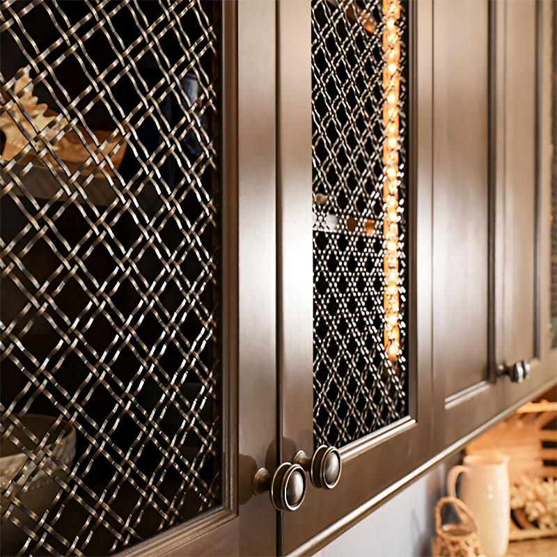 Arquimesh QKCWM decorative metal mesh panel used as a stylish interior partition in modern architectural design