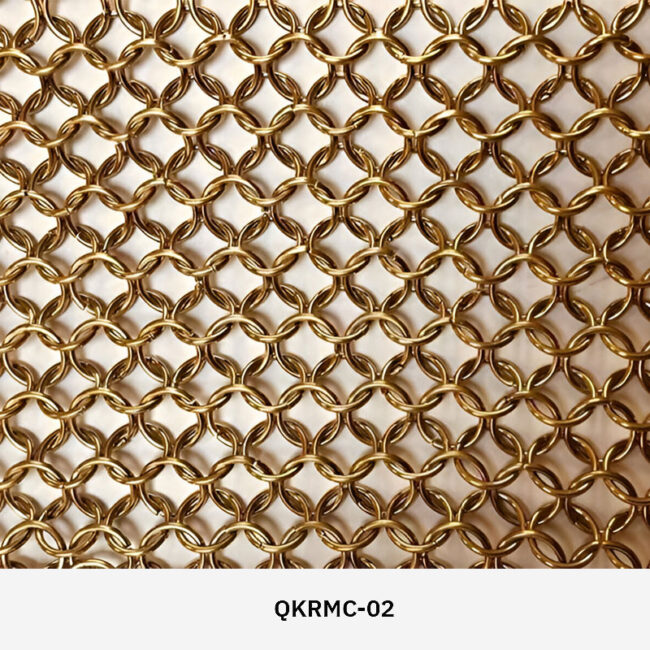 Decorion QKRMC decorative stainless steel ring mesh curtain used as a modern room divider in a commercial interior setting.