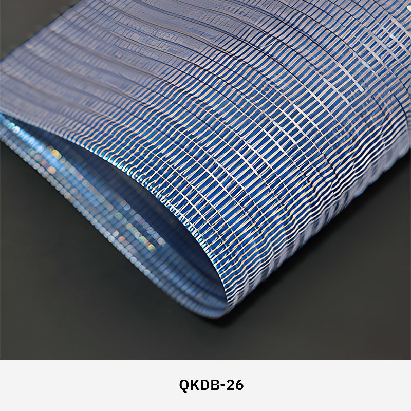 FibraMetis QKDB interior metal drapery used as a decorative wall panel, featuring woven wire fabric in custom colors and patterns
