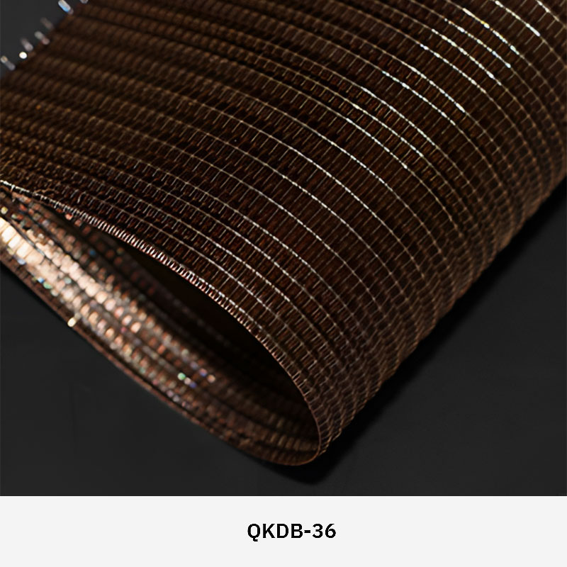 FibraMetis QKDB interior metal drapery used as a decorative wall panel, featuring woven wire fabric in custom colors and patterns