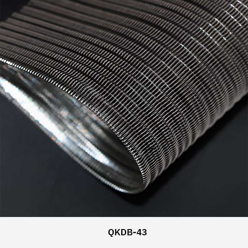 FibraMetis QKDB interior metal drapery used as a decorative wall panel, featuring woven wire fabric in custom colors and patterns