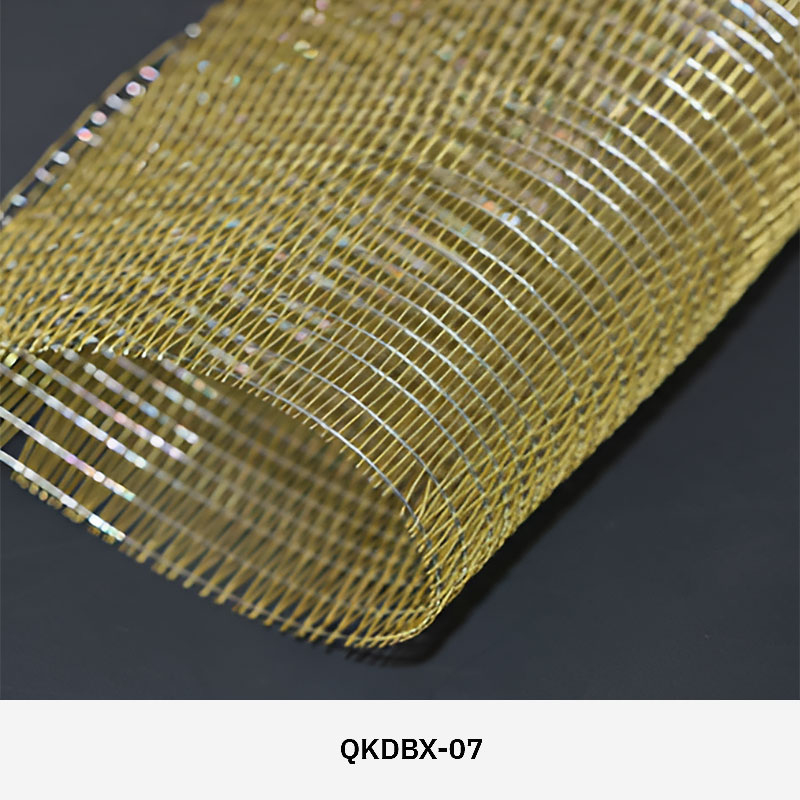 FibraMetis QKDBX decorative wire drapery installed as a modern wall panel, featuring custom woven metal mesh in silver finish