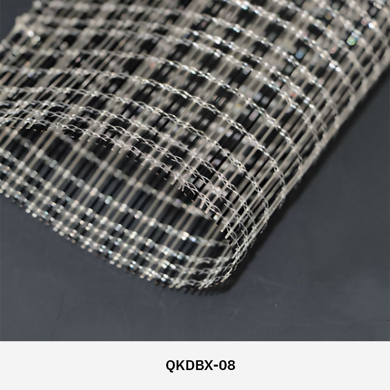 FibraMetis QKDBX decorative wire drapery installed as a modern wall panel, featuring custom woven metal mesh in silver finish