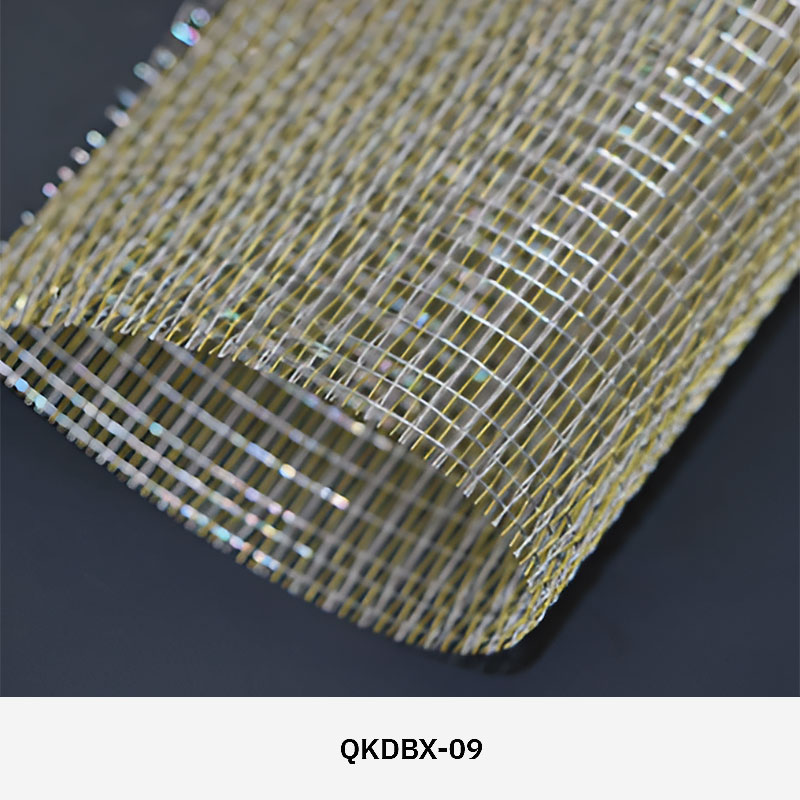 FibraMetis QKDBX decorative wire drapery installed as a modern wall panel, featuring custom woven metal mesh in silver finish