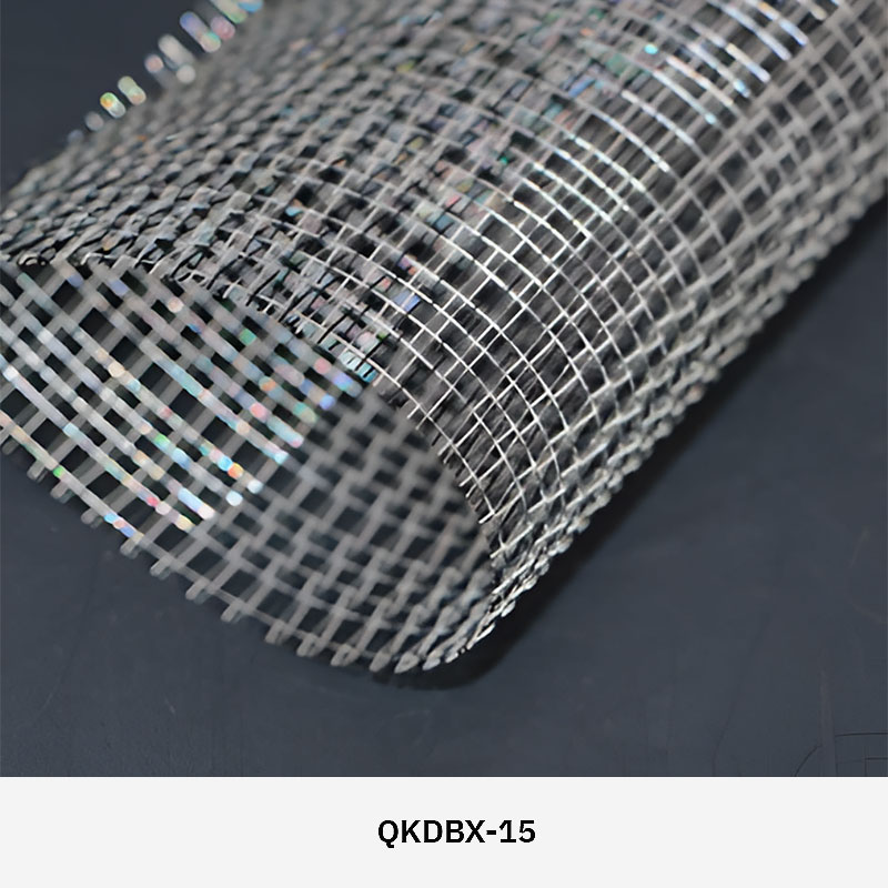 FibraMetis QKDBX decorative wire drapery installed as a modern wall panel, featuring custom woven metal mesh in silver finish