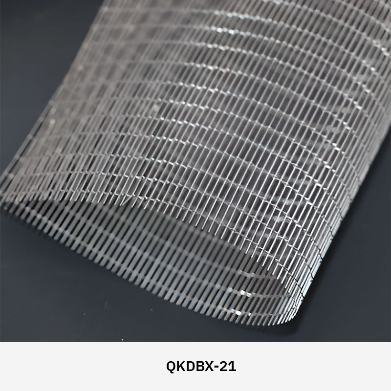 FibraMetis QKDBX decorative wire drapery installed as a modern wall panel, featuring custom woven metal mesh in silver finish