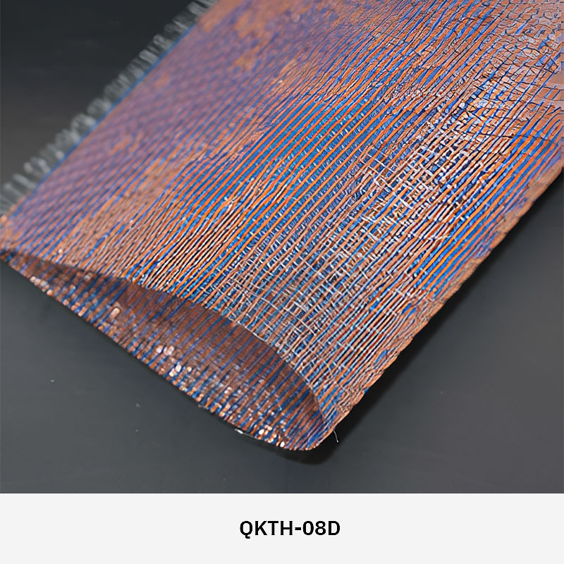 FibraMetis QKTH architectural mesh drapery used as interior wall cladding, featuring custom woven metal fabric with elegant metallic finishes.