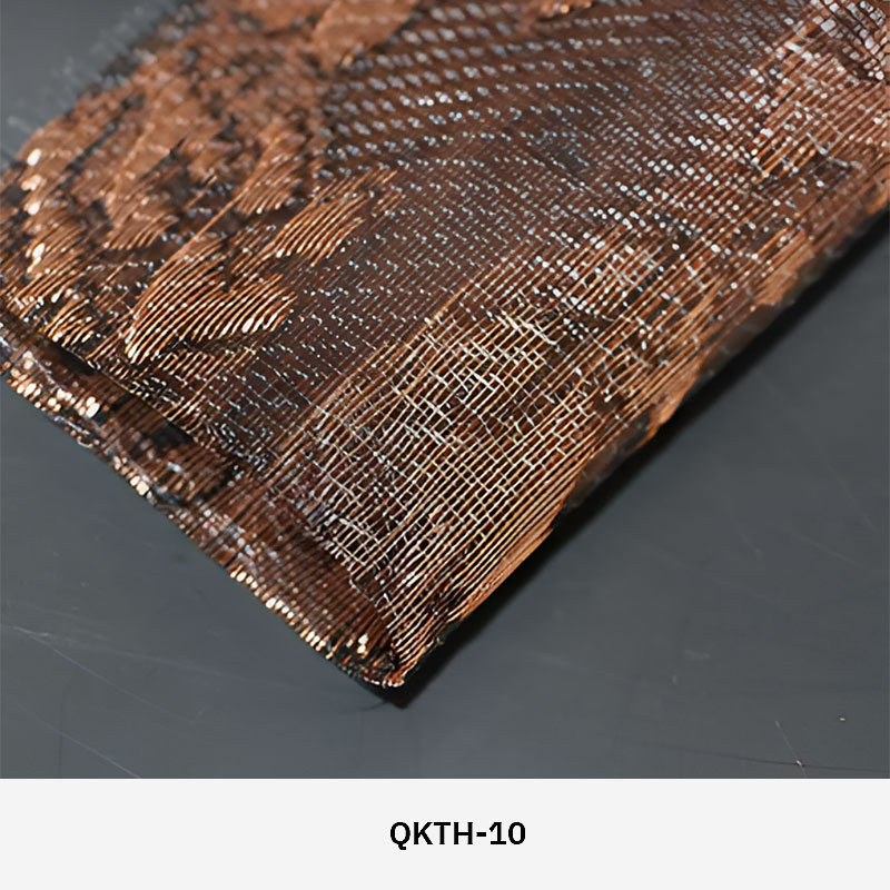 FibraMetis QKTH architectural mesh drapery used as interior wall cladding, featuring custom woven metal fabric with elegant metallic finishes.