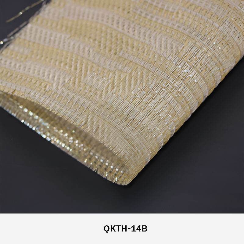 FibraMetis QKTH architectural mesh drapery used as interior wall cladding, featuring custom woven metal fabric with elegant metallic finishes.