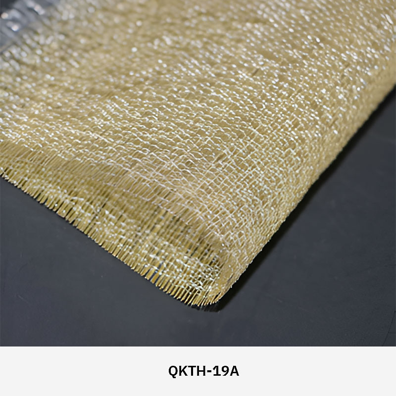 FibraMetis QKTH architectural mesh drapery used as interior wall cladding, featuring custom woven metal fabric with elegant metallic finishes.
