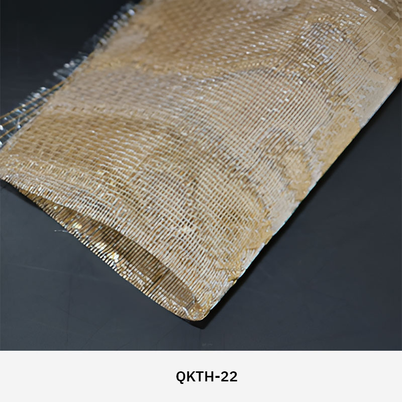 FibraMetis QKTH architectural mesh drapery used as interior wall cladding, featuring custom woven metal fabric with elegant metallic finishes.