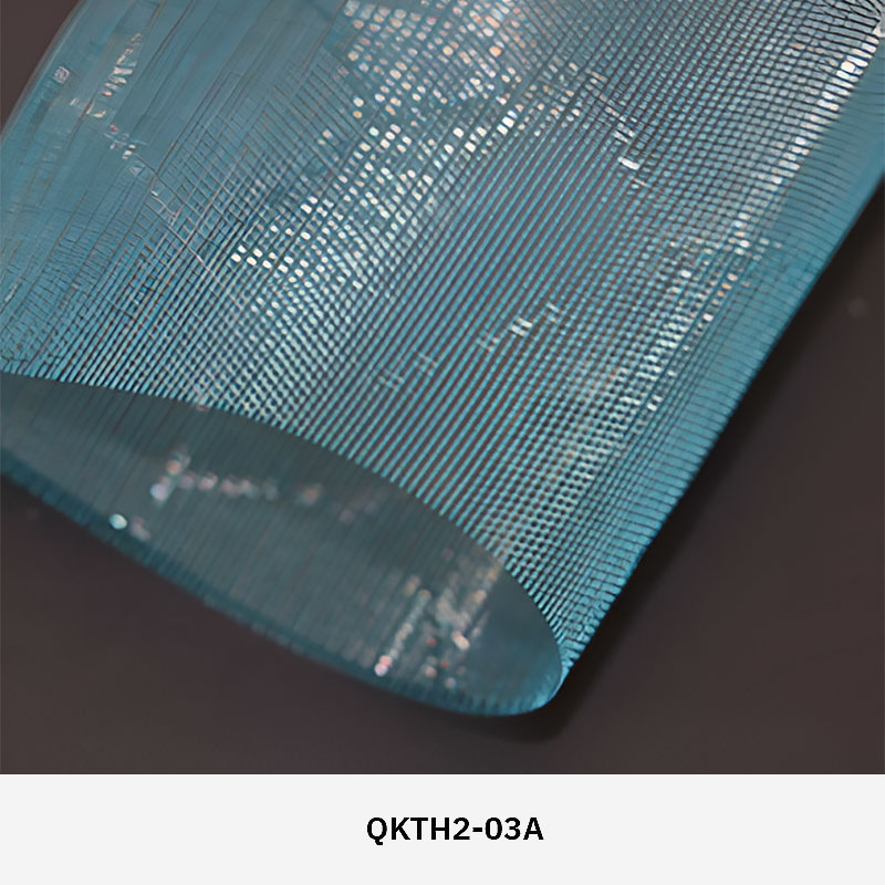 FibraMetis QKTH2 decorative wire textile applied on interior wall panels, featuring custom woven metal mesh with refined metallic finishes.