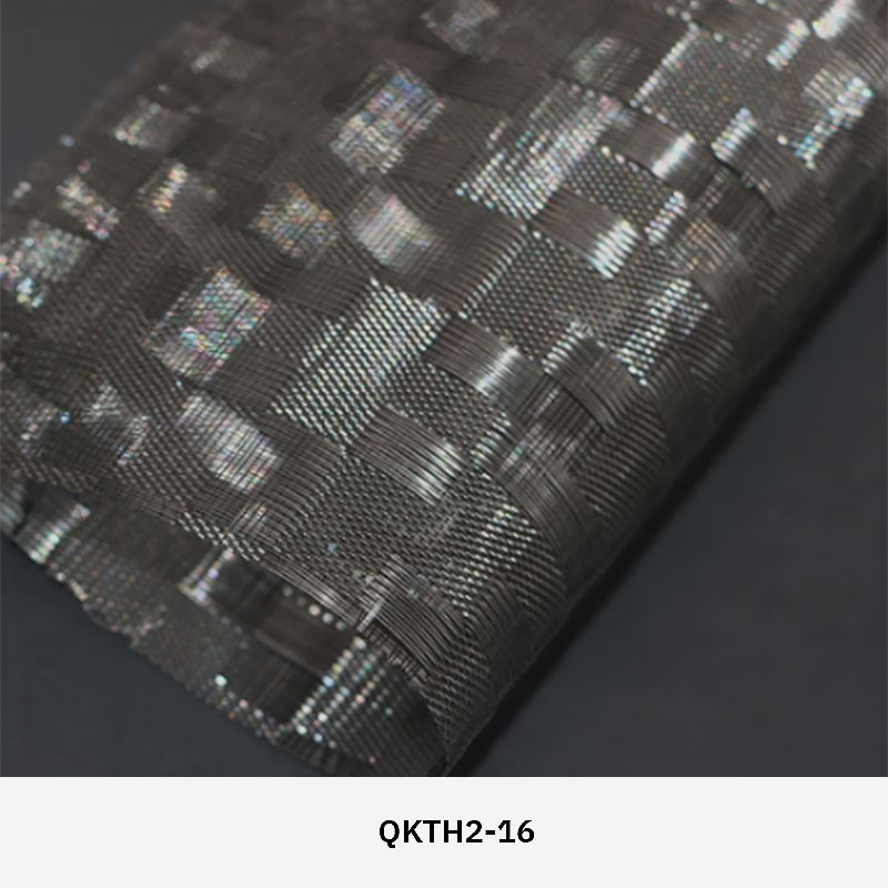 FibraMetis QKTH2 decorative wire textile applied on interior wall panels, featuring custom woven metal mesh with refined metallic finishes.