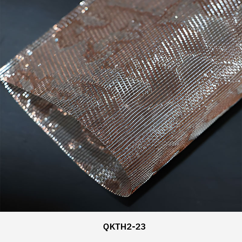 FibraMetis QKTH2 decorative wire textile applied on interior wall panels, featuring custom woven metal mesh with refined metallic finishes.
