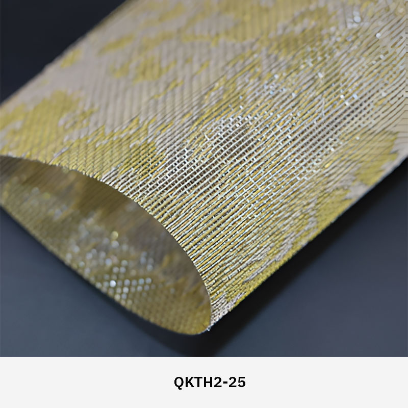 FibraMetis QKTH2 decorative wire textile applied on interior wall panels, featuring custom woven metal mesh with refined metallic finishes.