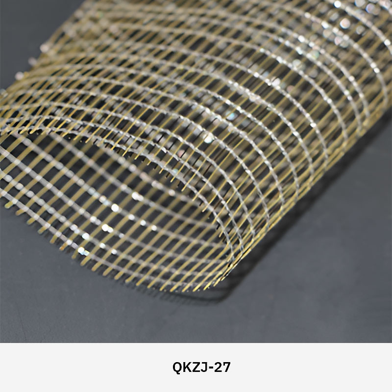 FibraMetis QKTH2 decorative wire textile applied on interior wall panels, featuring custom woven metal mesh with refined metallic finishes.