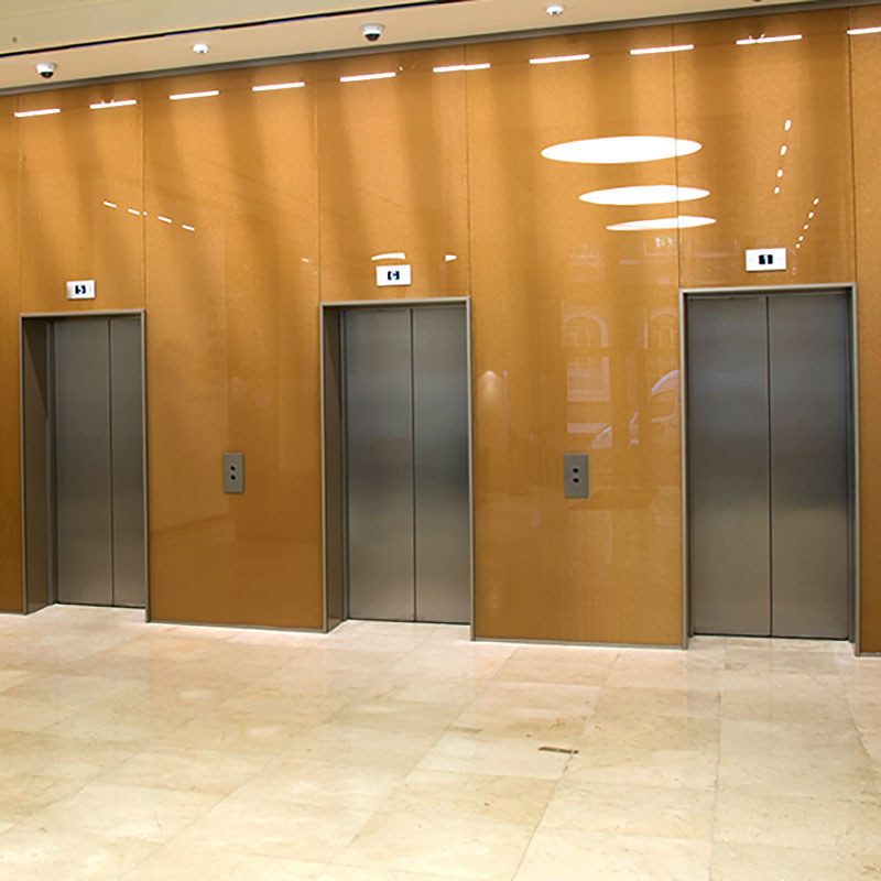 GlasMetis laminated wire mesh glass with metallic mesh layer, shown in custom finish for modern architectural use