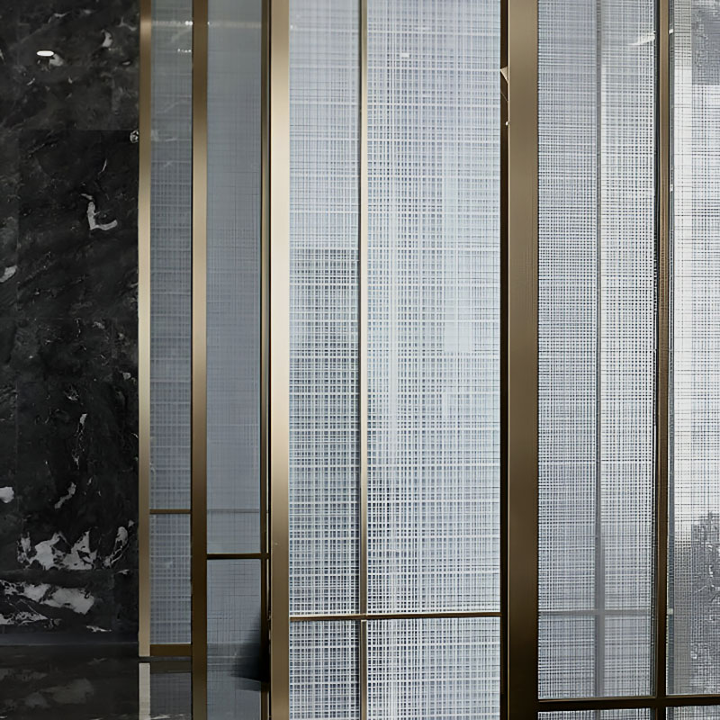 GlasMetis laminated wire mesh glass with metallic mesh layer, shown in custom finish for modern architectural use