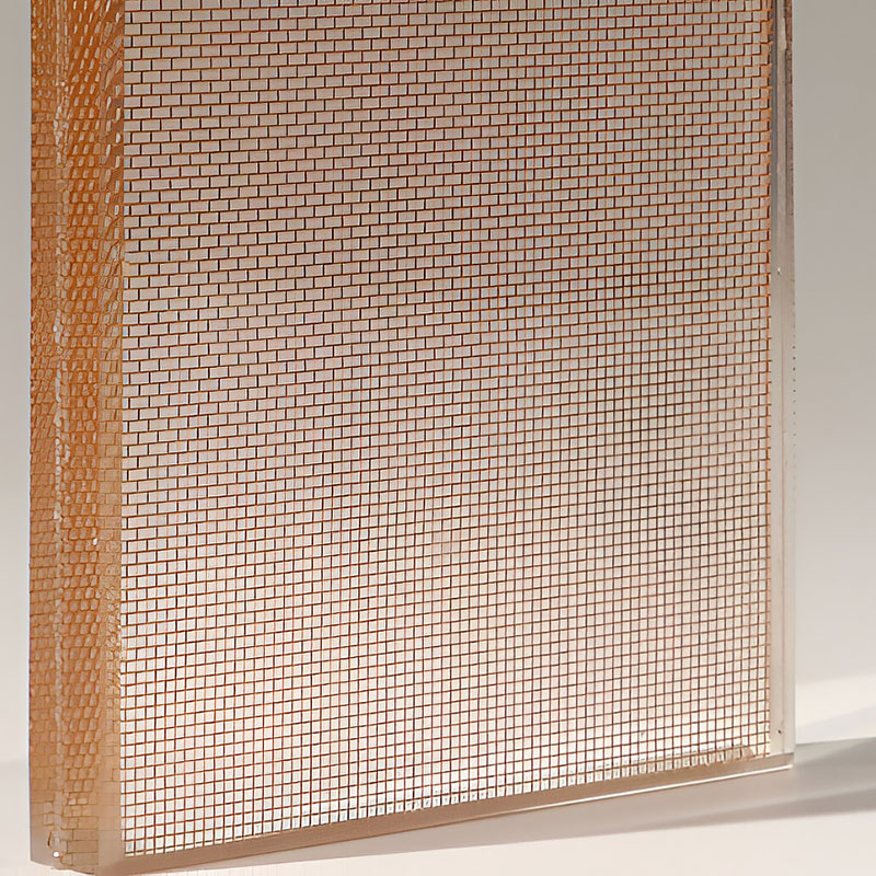 GlasMetis QKGCR laminated glass panel with crimped metal mesh insert for decorative and safety-focused architectural applications