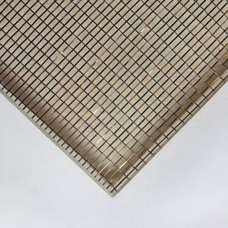 GlasMetis QKGDBX wire mesh laminated glass panel with metallic mesh layer, shown in custom finish for modern interiors