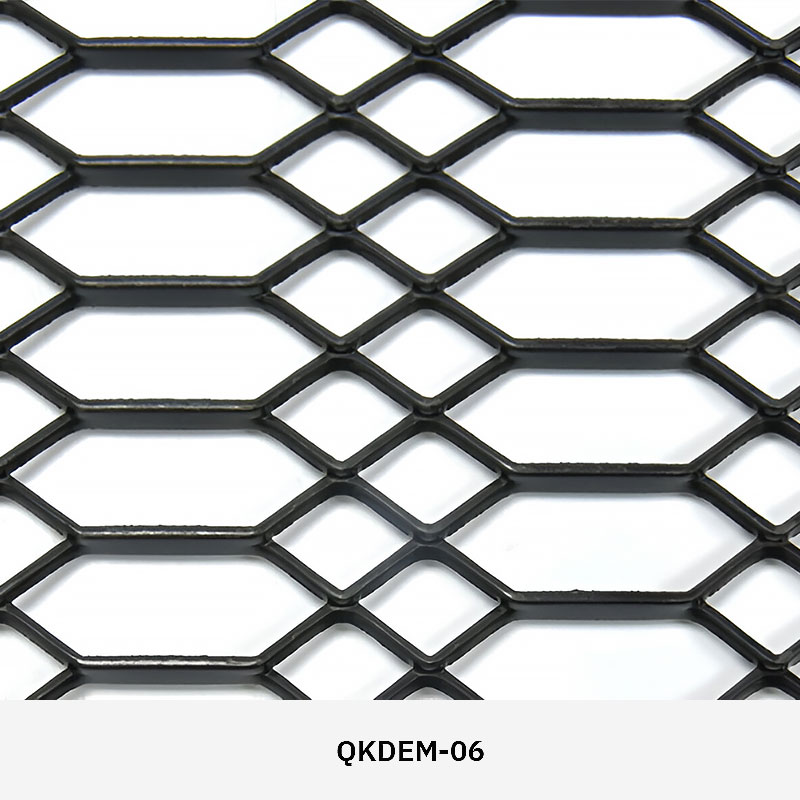 Expanded metal mesh panel with diamond-shaped openings used as architectural partition and facade feature.