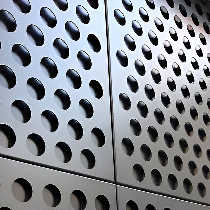 Decorative perforated metal mesh panel with round hole pattern, ideal for interior walls, ceilings, and floors, crafted from stainless steel.