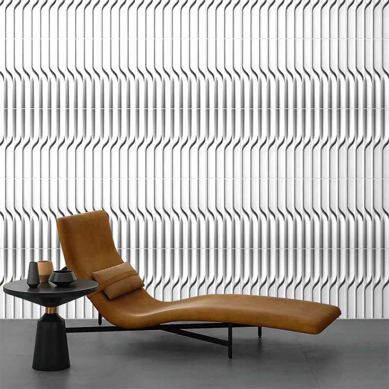 Modern 3D wall tile made from ultra-high performance concrete with sculptural grooves, ideal for feature walls in residential and commercial interiors.