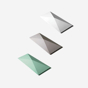 Geometric 3D wall tile with triangular pattern in matte and metallic finish, ideal for residential and commercial interior feature walls.