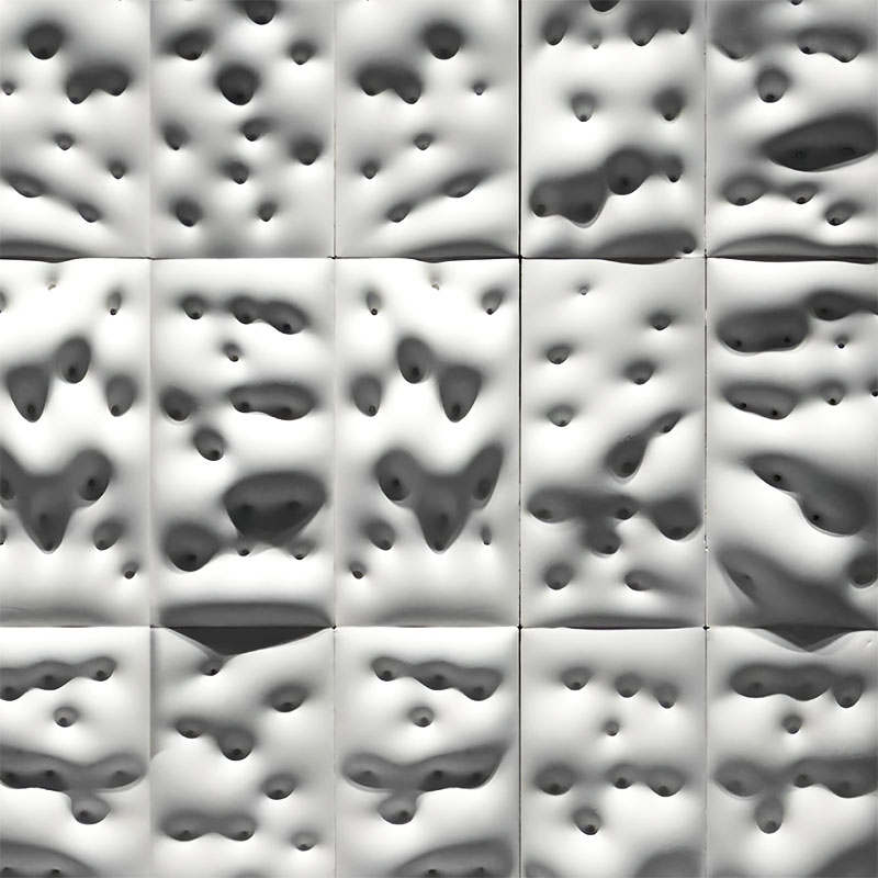 Formavox 67WW dimple-textured concrete wall tile in matte finish, showing fluid, organic surface for interior design.