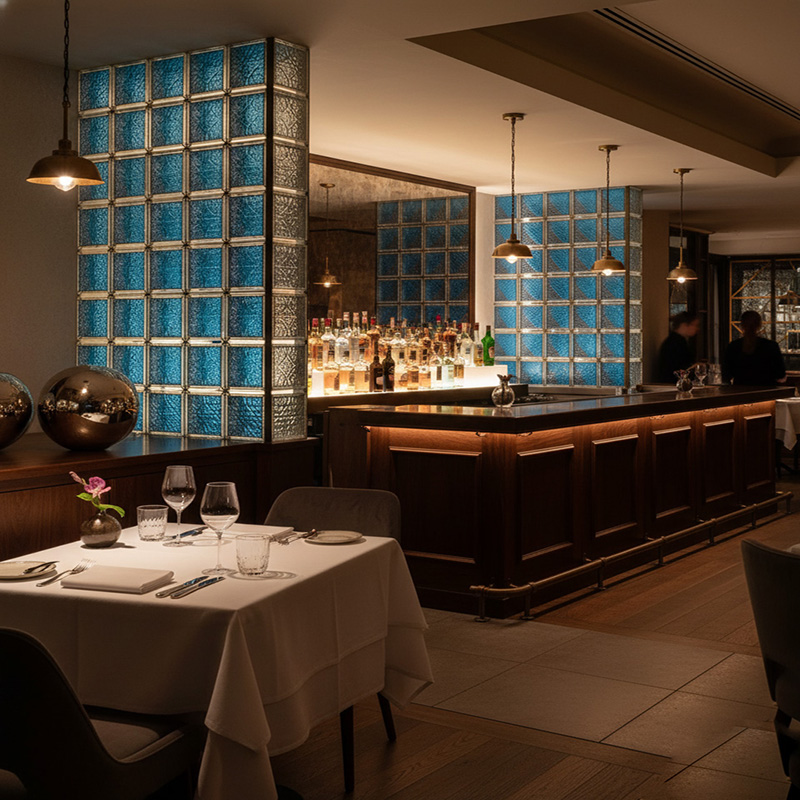 Colored modern decorative glass tile collection by ORNVITRUM featuring textured crystal and hot-melt glass panels for interior partitions and walls.