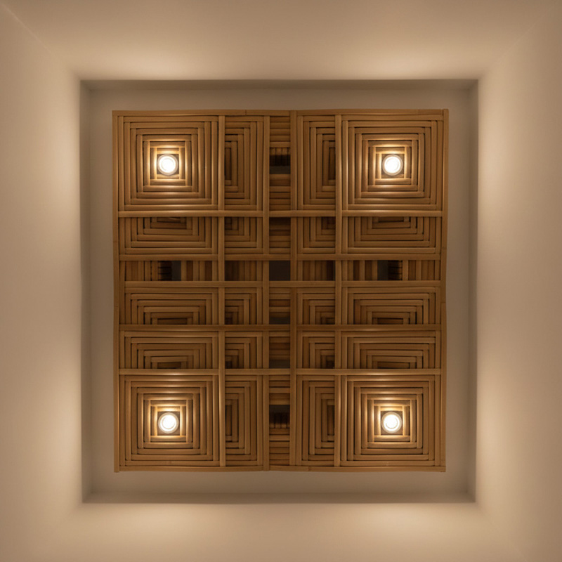 Modern 3D synthetic rattan panel with woven geometric pattern for architectural and interior use