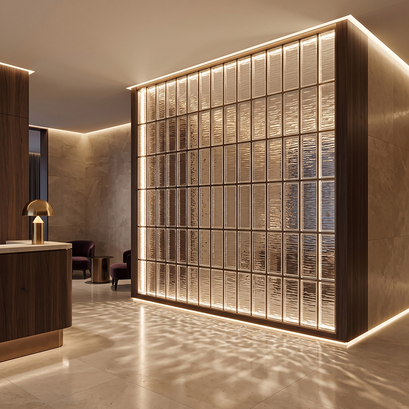 ORNVITRUM-CFRTGB Ripple Textured Glass Block with a flowing textured surface for decorative interior applications.