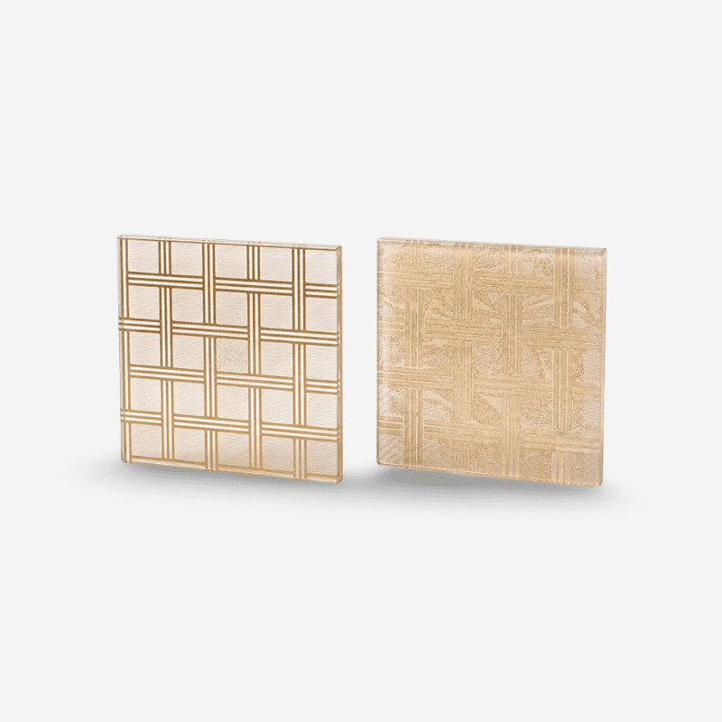 Framed decorative laminated glass panel with geometric gold grid pattern for luxury feature walls and glass partitions.